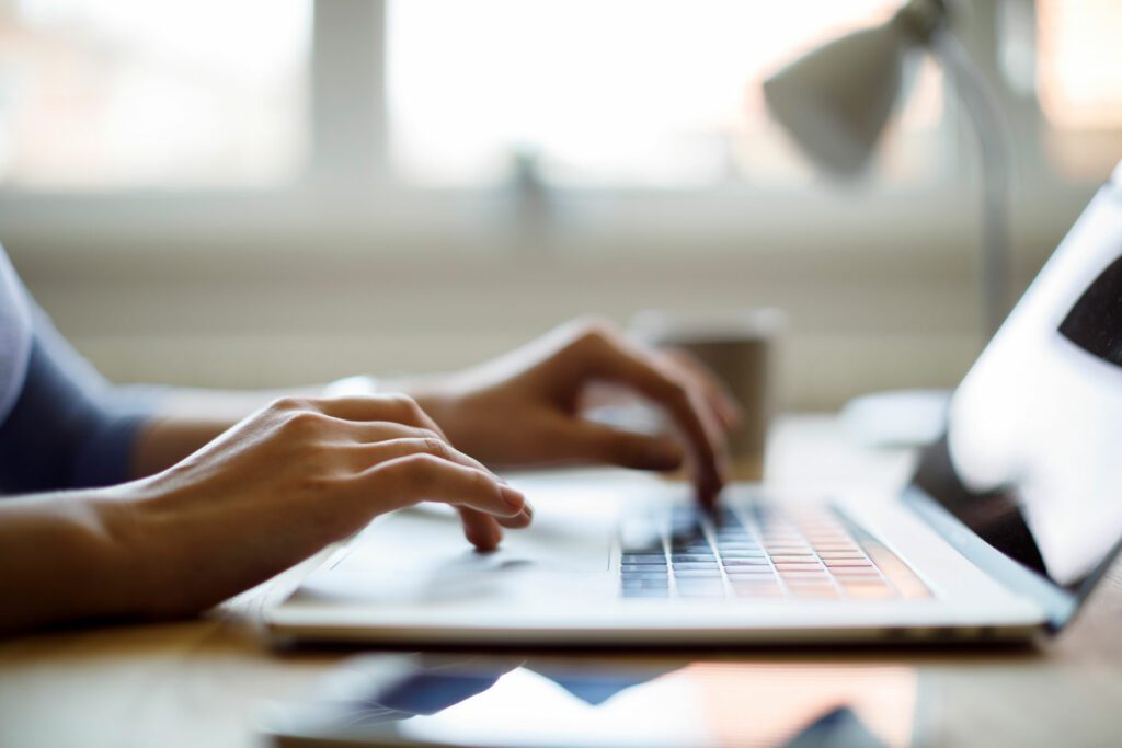 Woman using her laptop for working from home