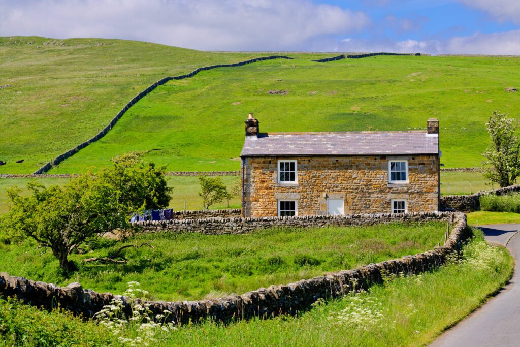 Farmhouse amid Hills and Meadows